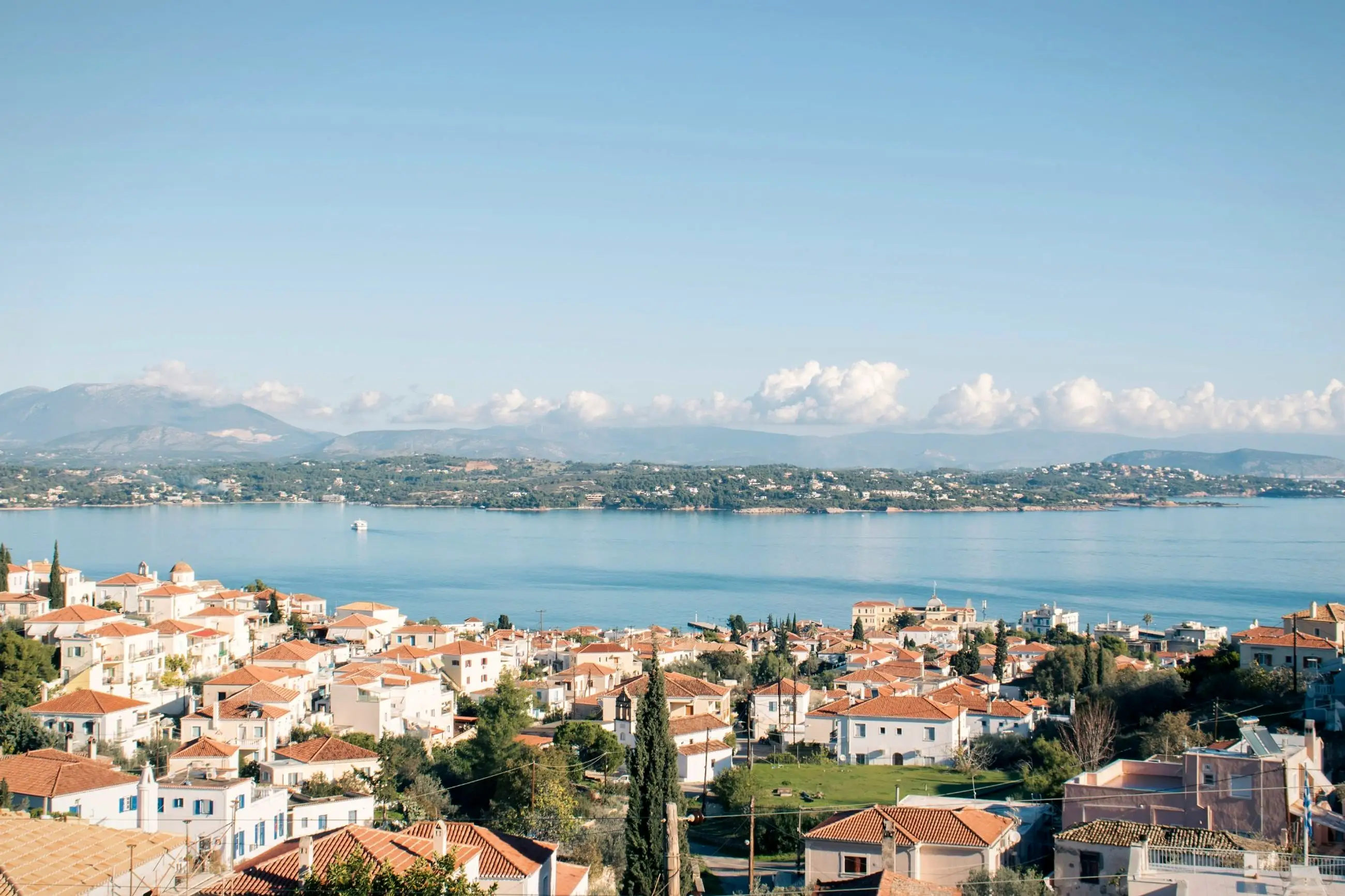The roofs of Spetses town, with the sea and the mountains of the Peloponnese beyond
